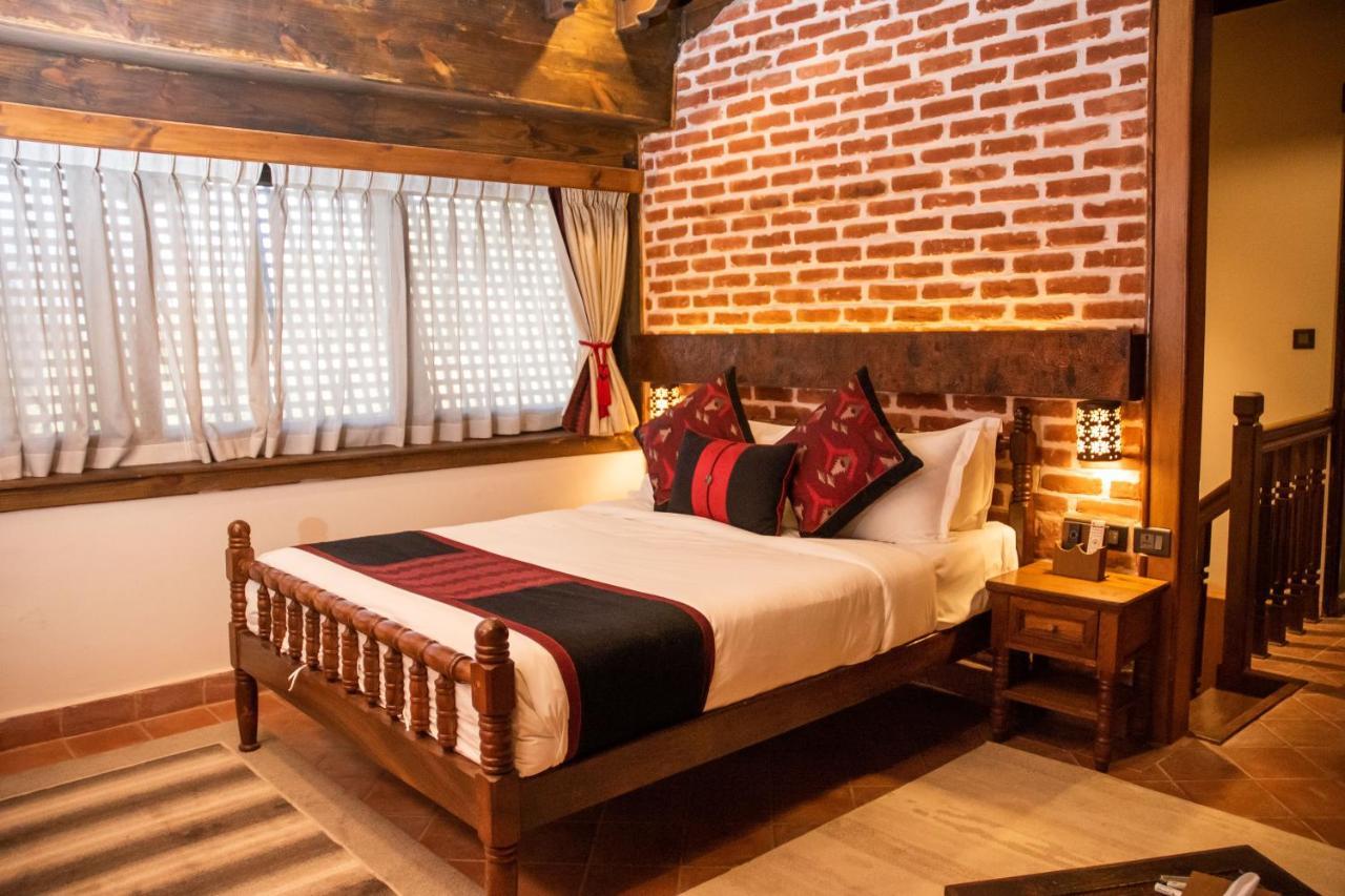 Basera Boutique Hotel Catmandu Exterior foto A room at the hotel